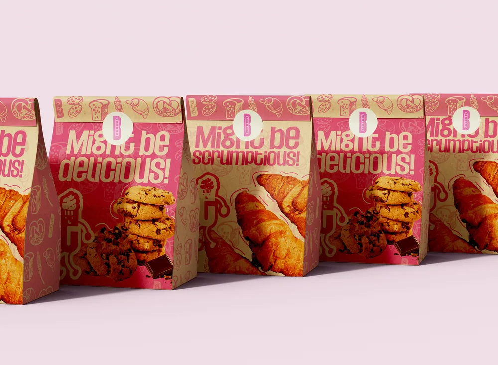A row of The Bakery pastry boxes reading “Might be delicious!” and “Might be scrumptious!”